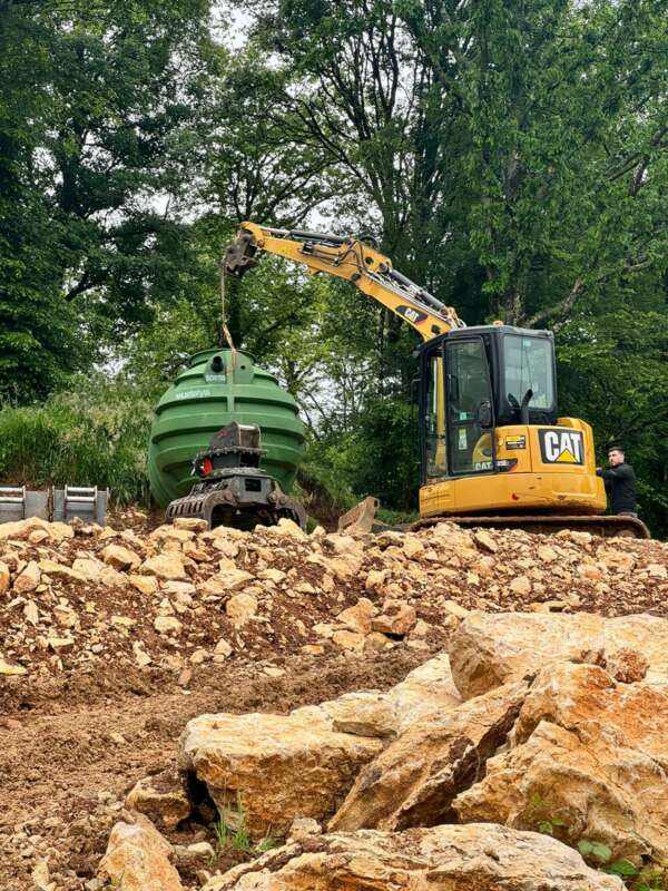 installation de cuve de récupération d'eau de pluie